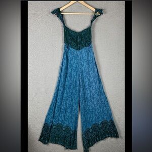 Free People Jumpsuit with pockets and cap sleeves to wear up or down